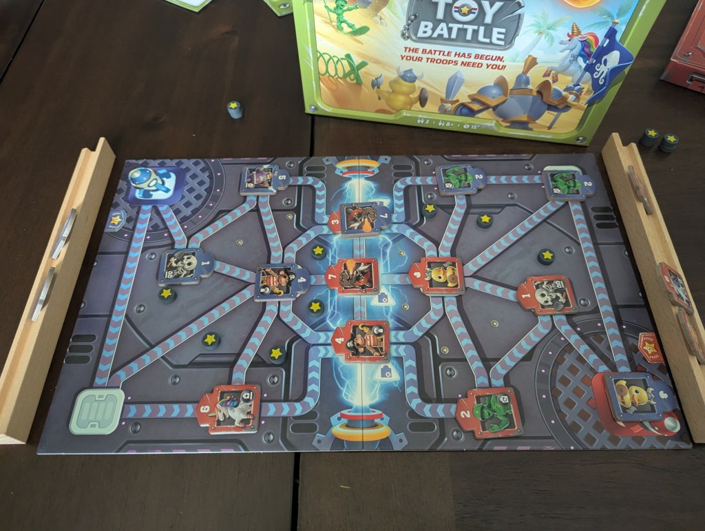 A completed game of Toy Battle on the laser factory map. Blue has won with a couple of the 2s chaining into the enemy headquarters.